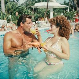 Middle-aged pool party, pineapples and flamingos (surreal), FFF Cruises: Voyage 01 · FFF\CRS\016\021