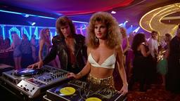 The heavy metal band, dancers behind, FFF Cruises: Voyage 01 · FFF\CRS\090\012